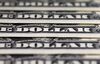 U.S. one dollar banknotes are arranged for a photograph in Tokyo, Japan, on Thursday, Sept. 7, 2017. Japanese stocks fell as the yen strengthened while investors prepared themselves for the economic damage that Hurricane Irma may inflict on Florida and mulled U.S. President Donald Trump�s most recent comments on North Korea.