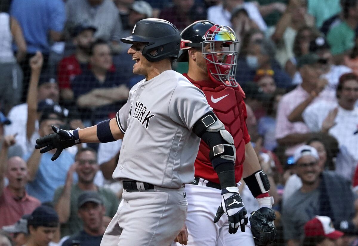 Boston Red Sox catcher Kevin Plawecki, left, celebrates with