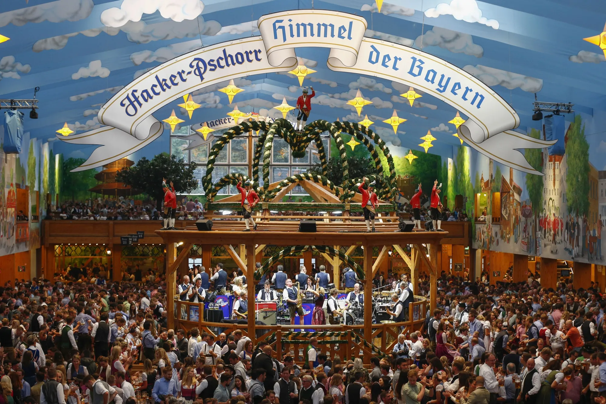 Musicians perform on a bandstand inside a beer tent at the Oktoberfest in 2019.