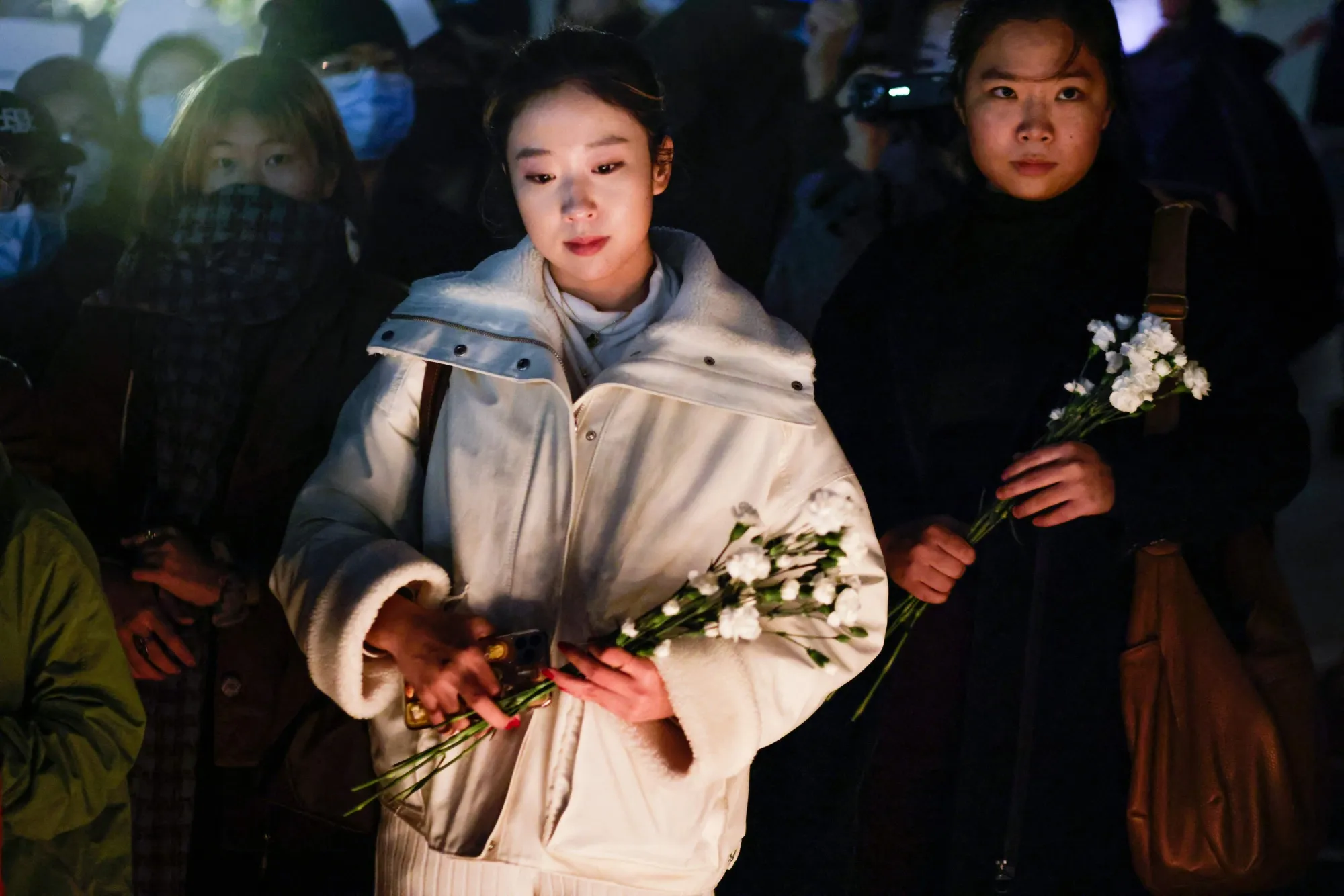 People gather in New York during a protest in support of demonstrations held in China calling for an end to Covid-19 lockdowns.