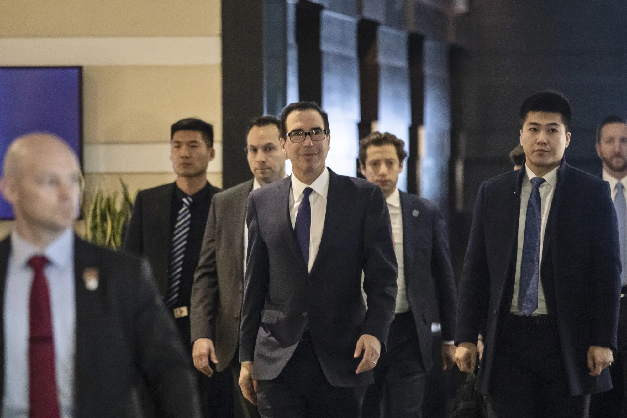 Steven Mnuchin leaves a hotel ahead of trade talks in Beijing on Feb. 13.