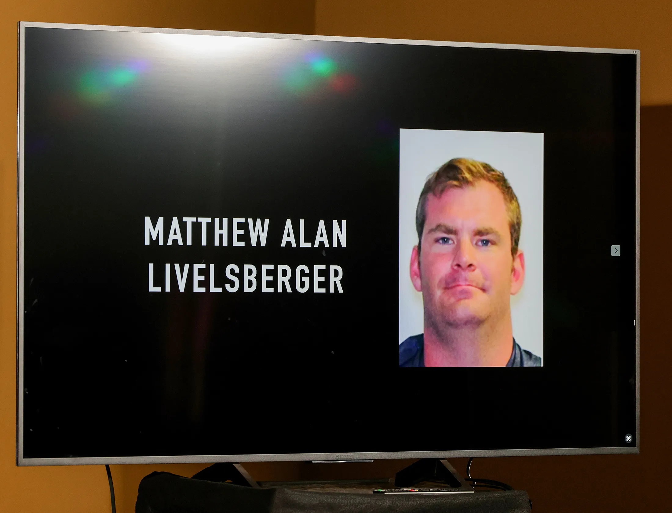 An image of Matthew Alan Livelsberger driver’s license photo on a monitor during a news conference at Las Vegas Metropolitan Police Department headquarters on Jan. 2.