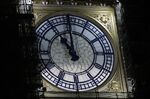 The clock face of Elizabeth Tower shows the hands at eleven o'clock at night, at the Houses of Parliament.