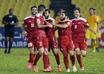 Syria players in action against China in June.