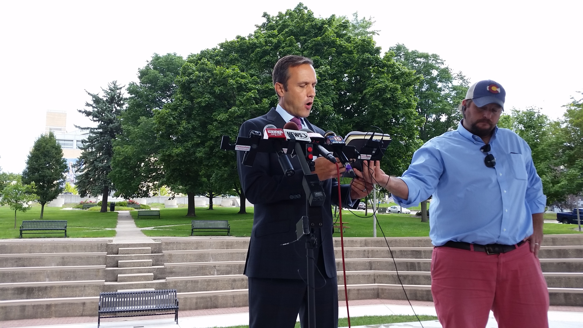 Paul Ryan’s Republican primary rival, Paul Nehlen, reads a statement to the media on Aug. 3, 2016, with the assistance of aide Noel Fritsch, outside a courthouse in Janesville, Wisconsin.
