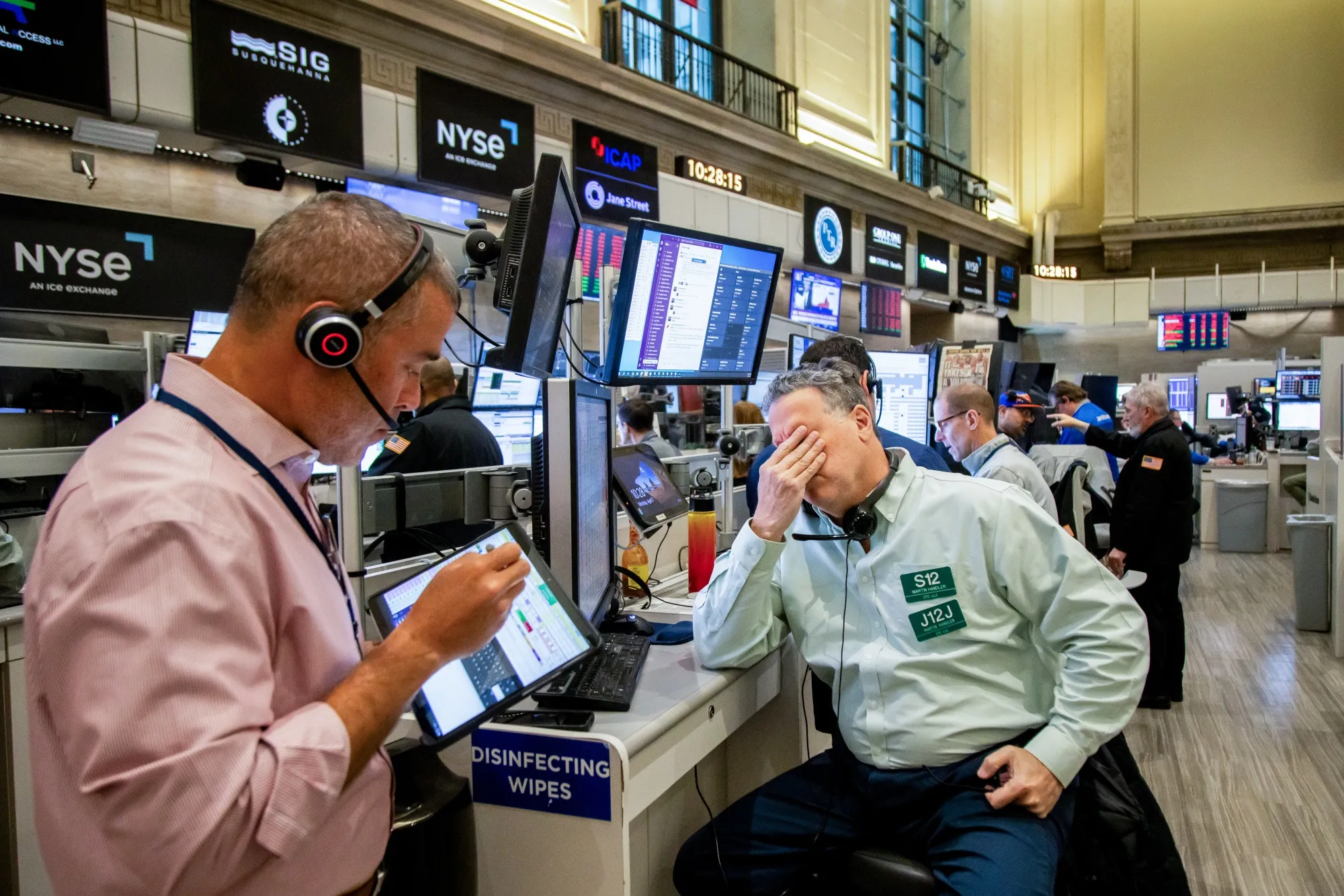 Traders work on the floor of the New York Stock Exchange.