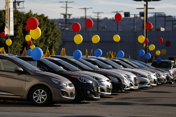 Focus: Big U.S. auto dealers bet billions against the death of the  dealership
