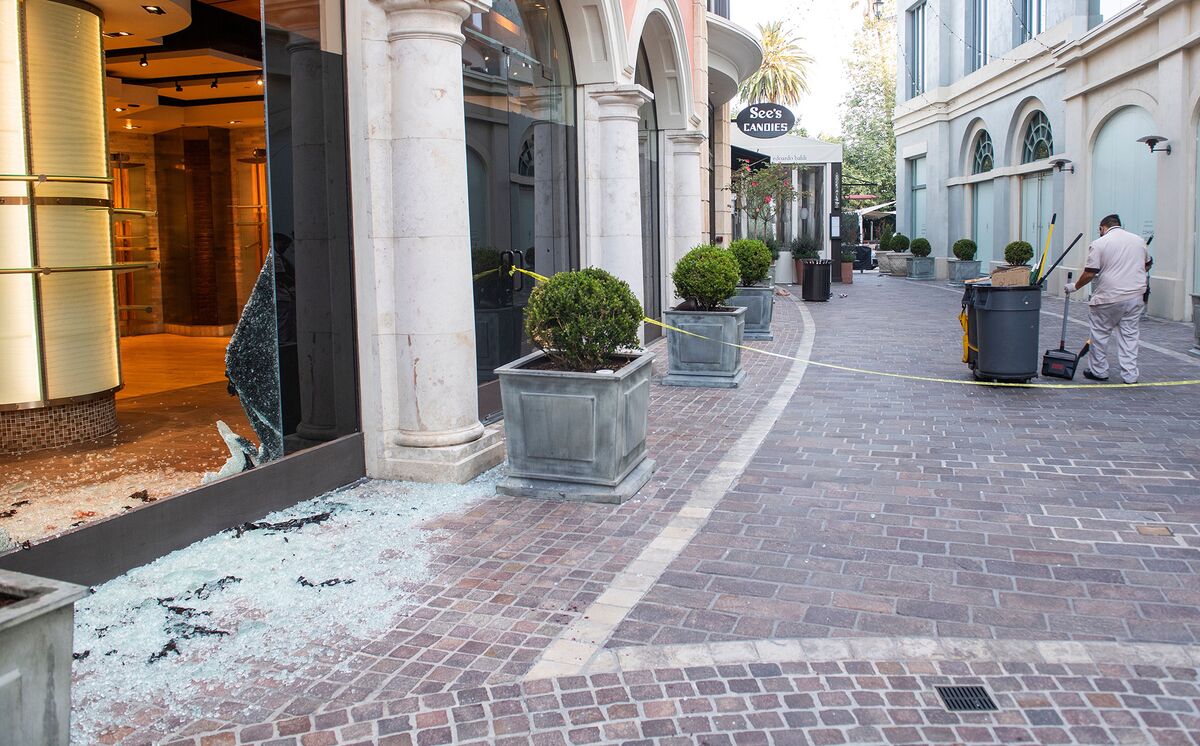 Nike Shoppers Line Up 11/2 Hours at Billionaire’s Reopened Mall