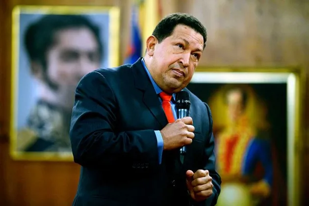 Former Venezuelan President Hugo Chavez gestures during a press conference in Caracas on Oct. 9, 2012