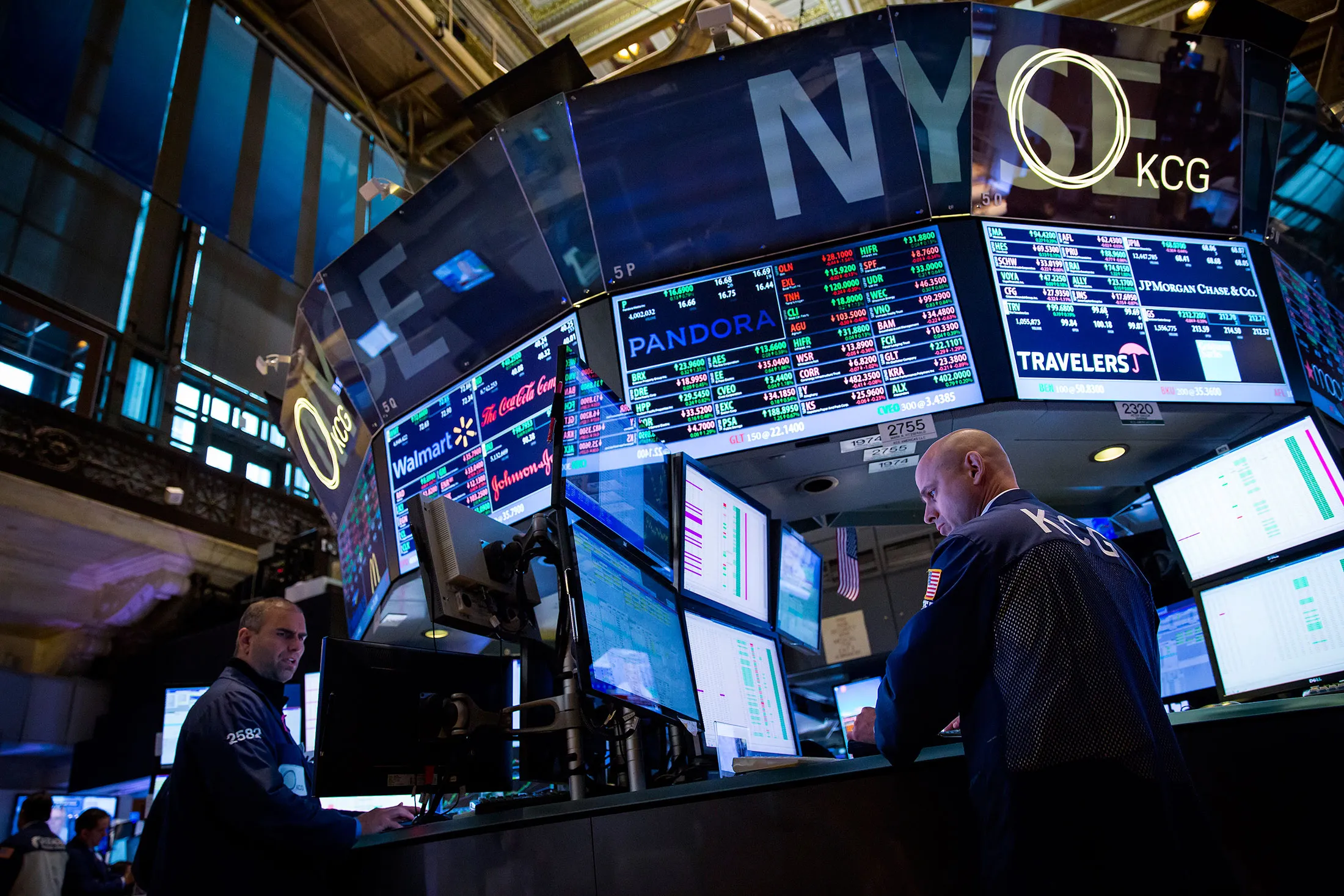 Traders work on the floor of the New York Stock Exchange in New York City.

