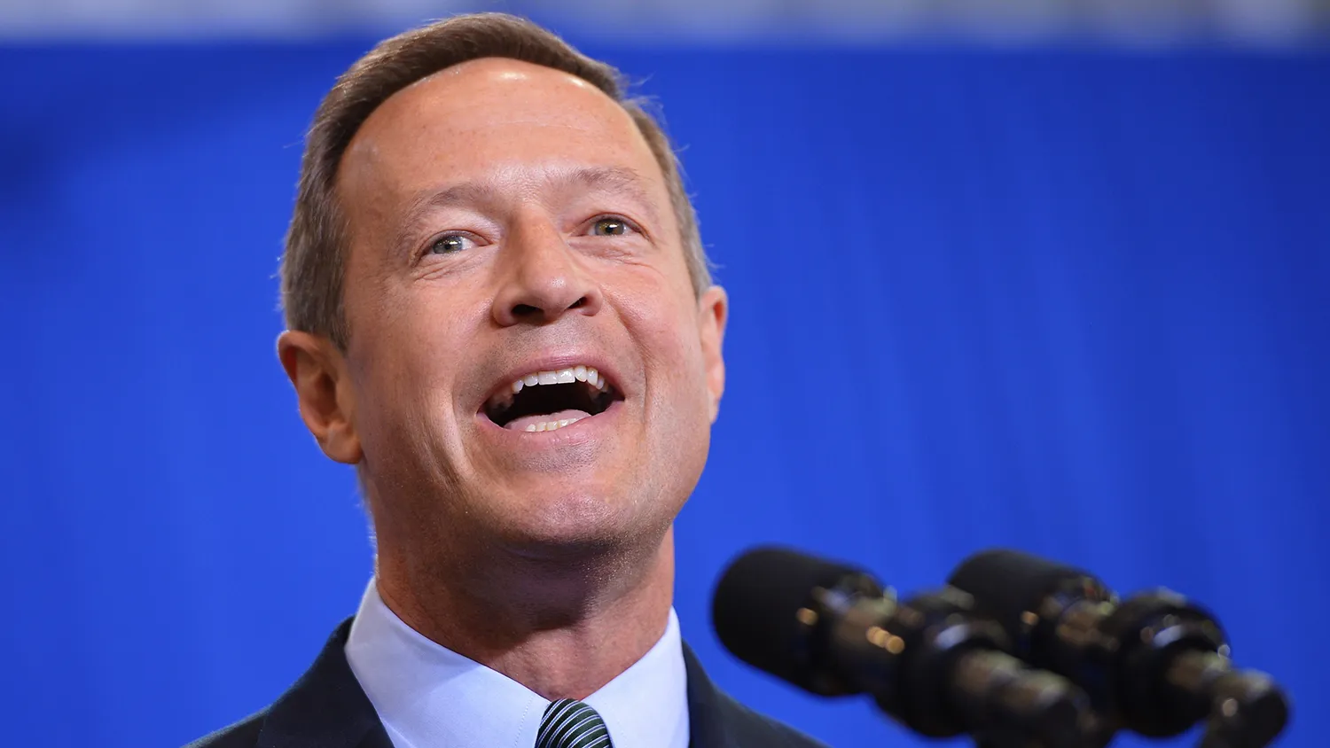 Maryland Governor Martin O'Malley introduces US President Barack Obama at Prince Georges Community College on September 26, 2013 in Largo, Maryland.
