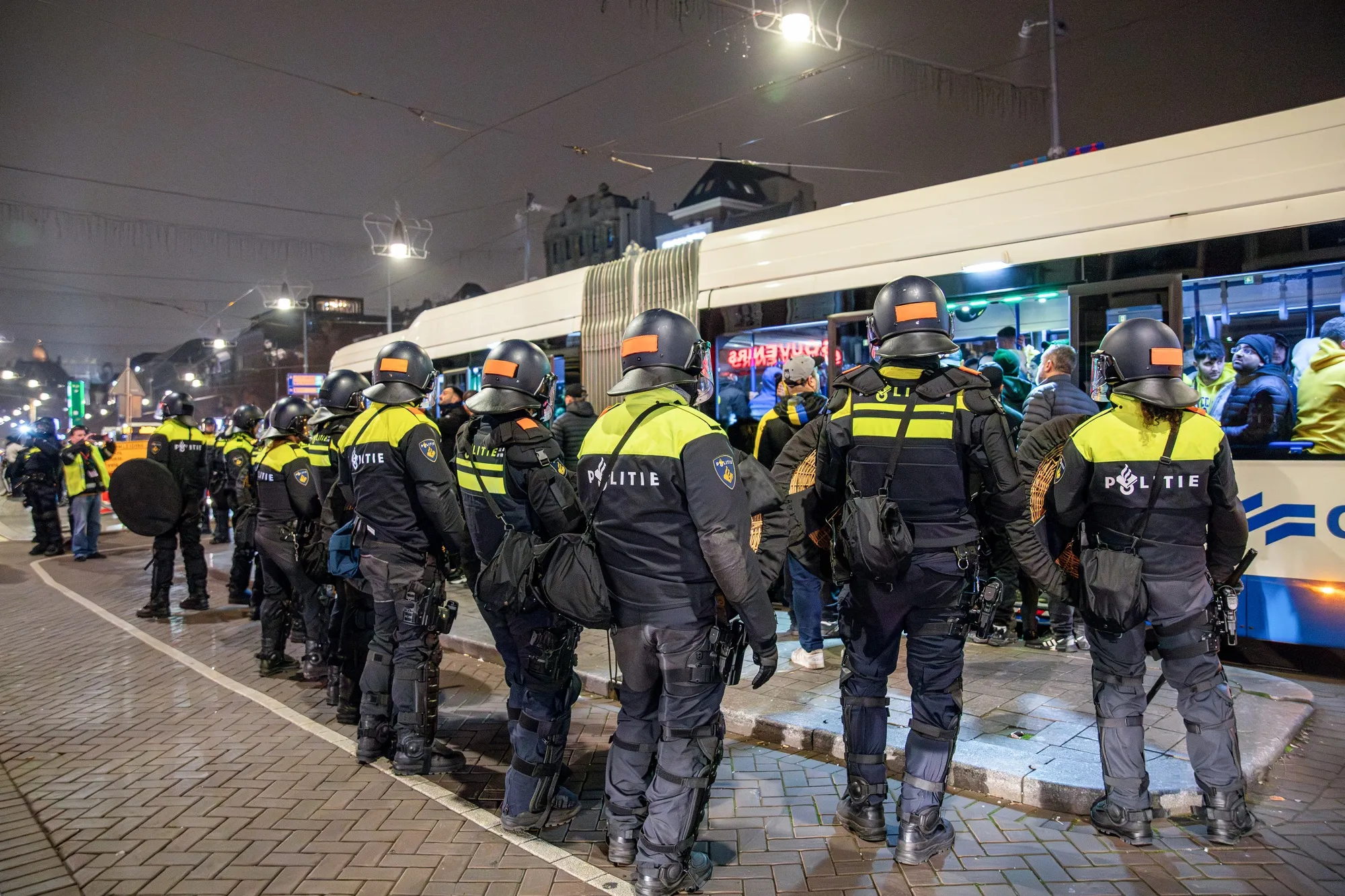 Police officers stand guard after clashes between Israeli and pro-Palestinian football fans in Amsterdam, on Nov. 8.