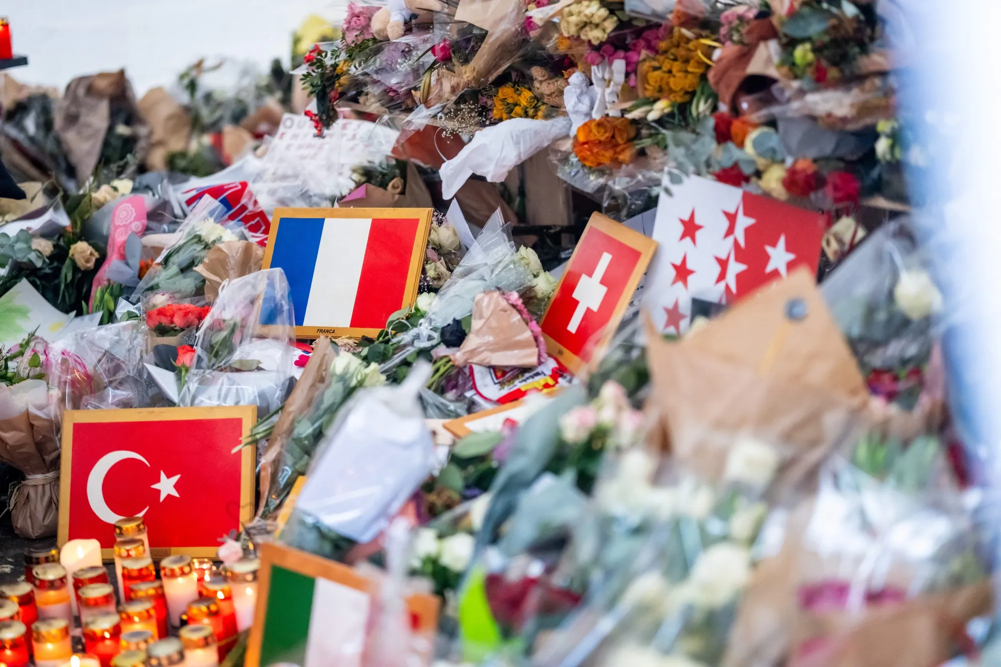 Messages and flowers at a memorial in front of the Le Constellation bar, in Crans-Montana, Switzerland, on Jan. 9.