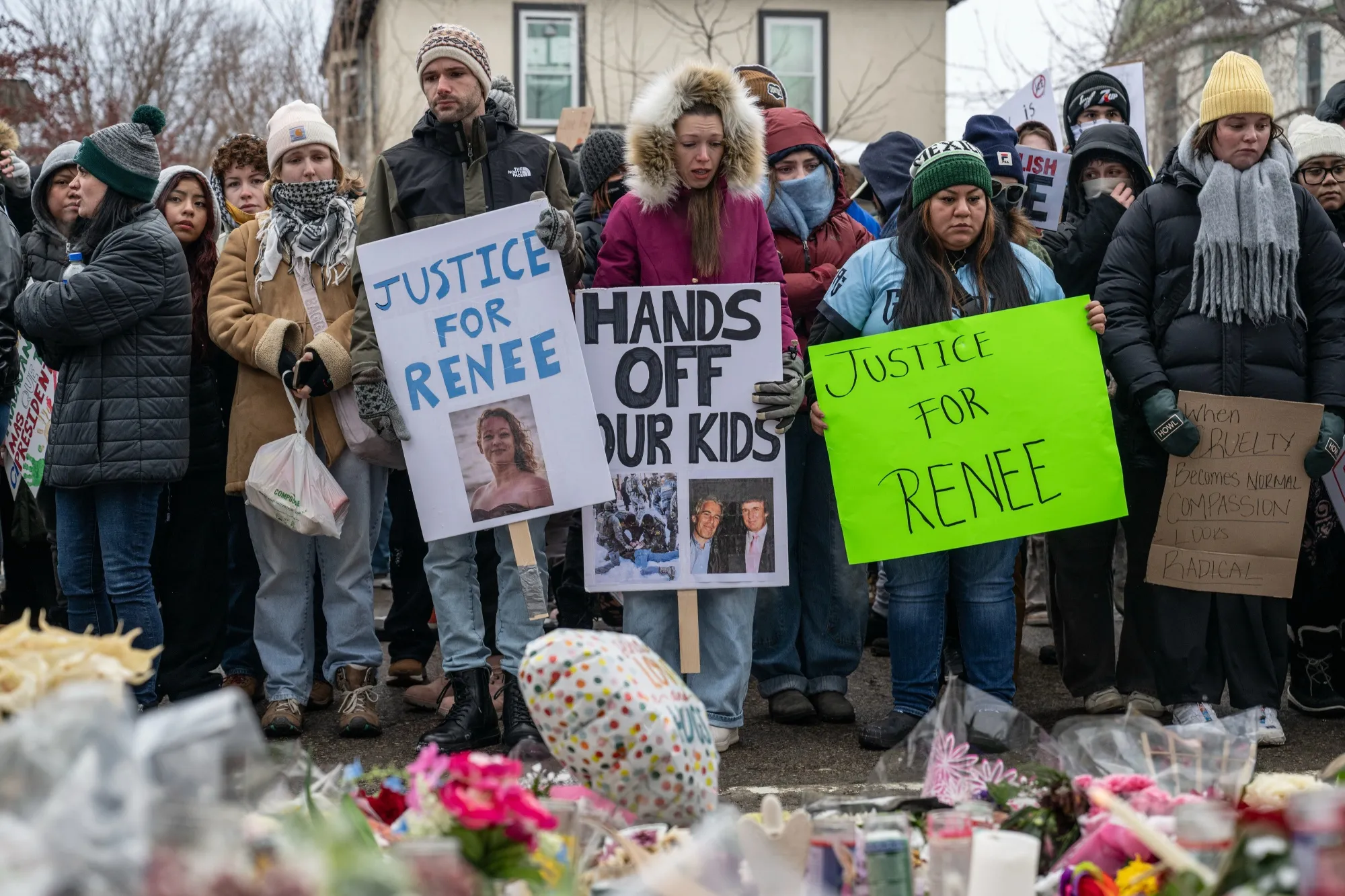 Demonstrators at a memorial for Renée Nicole Good during a protest in Minneapolis on Jan. 10.