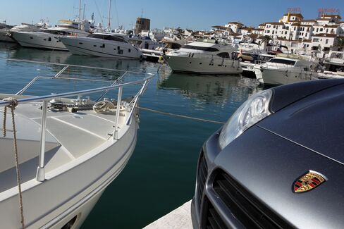 Luxury yachts float in Puerto Banus, Marbella’s marina and luxury shopping district