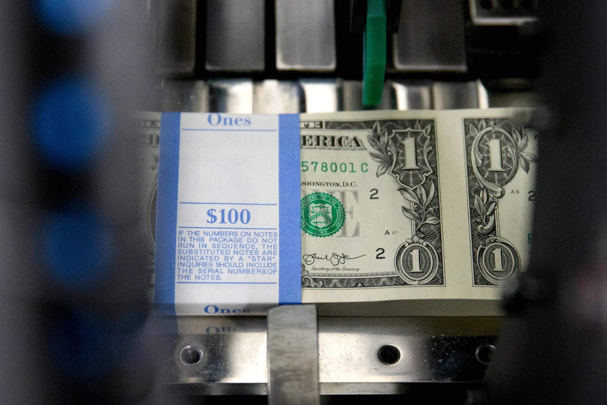 Operations At The Bureau Of Engraving And Printing As The $1 Bill Is Printed