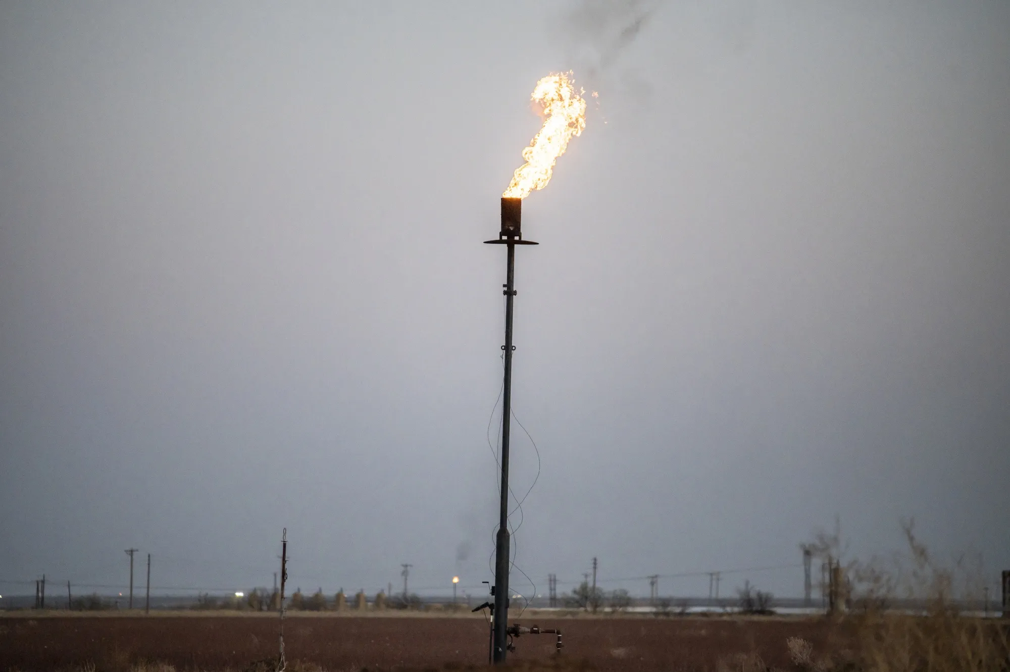 A gas flare stack at an oil well in Midland, Texas, US, on Thursday, April 7, 2022.&nbsp;