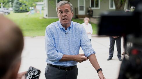 Former Florida Governor Jeb Bush speaks to the media following a campaign stop in Washington, Iowa, on June 17, 2015.