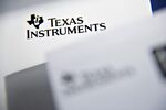 The Texas Instruments Inc. logo is displayed for a photograph in Tiskilwa, Illinois, U.S., on Sunday, April 17, 2011. 