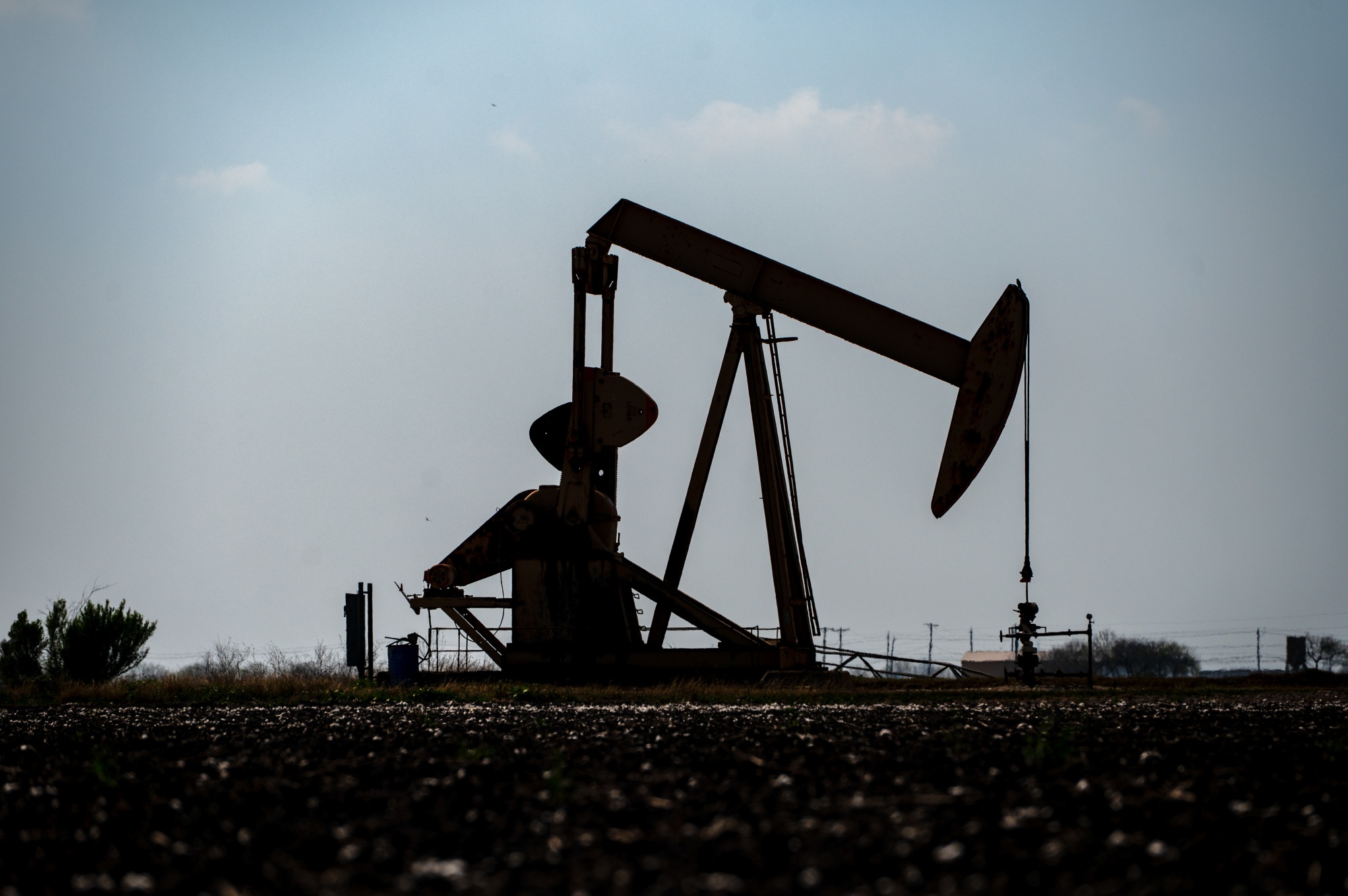 An oil pump jack in Corpus Christi, Texas, US, on Saturday, Feb. 28, 2026. President Donald Trump's decision to strike Iran creates new risks for a significant chunk of the world's oil supply. Photographer: Eddie Seal/Bloomberg