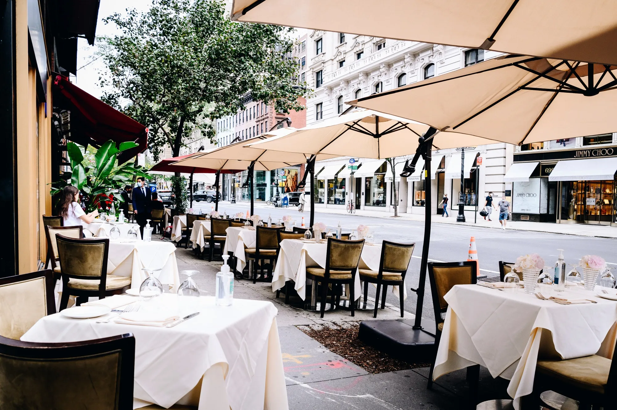 Empty tables during lunch service on Madison Avenue on Saturday, Sept. 26, 2020.