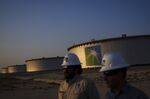 Crude oil storage tanks stand in the Juaymah tank farm at Saudi Aramco's Ras Tanura oil refinery and terminal at Ras Tanura, Saudi Arabia, on Monday, Oct. 1, 2018.