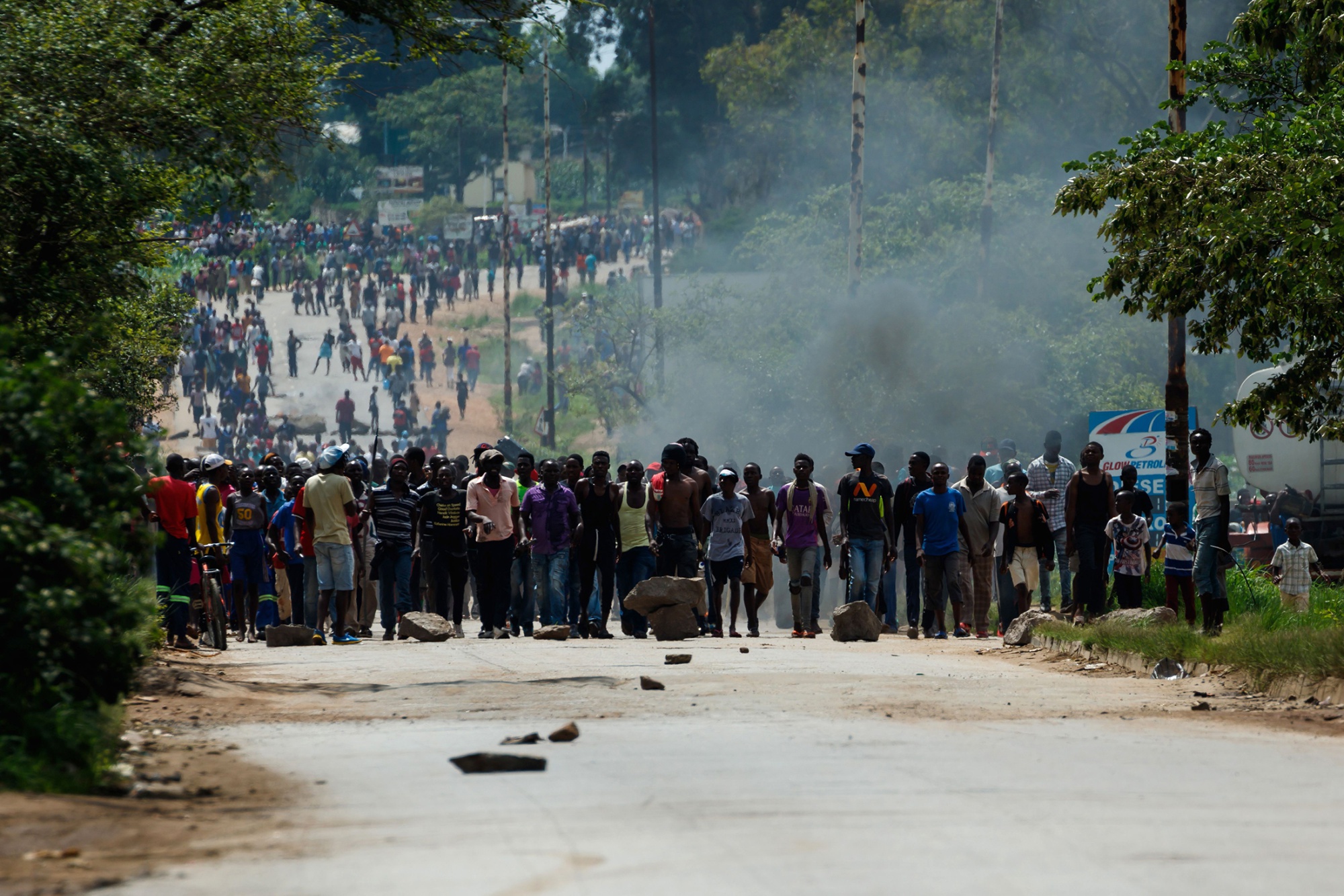 Protesters march on the road to Harare from Epworth township on Jan.&nbsp;14.