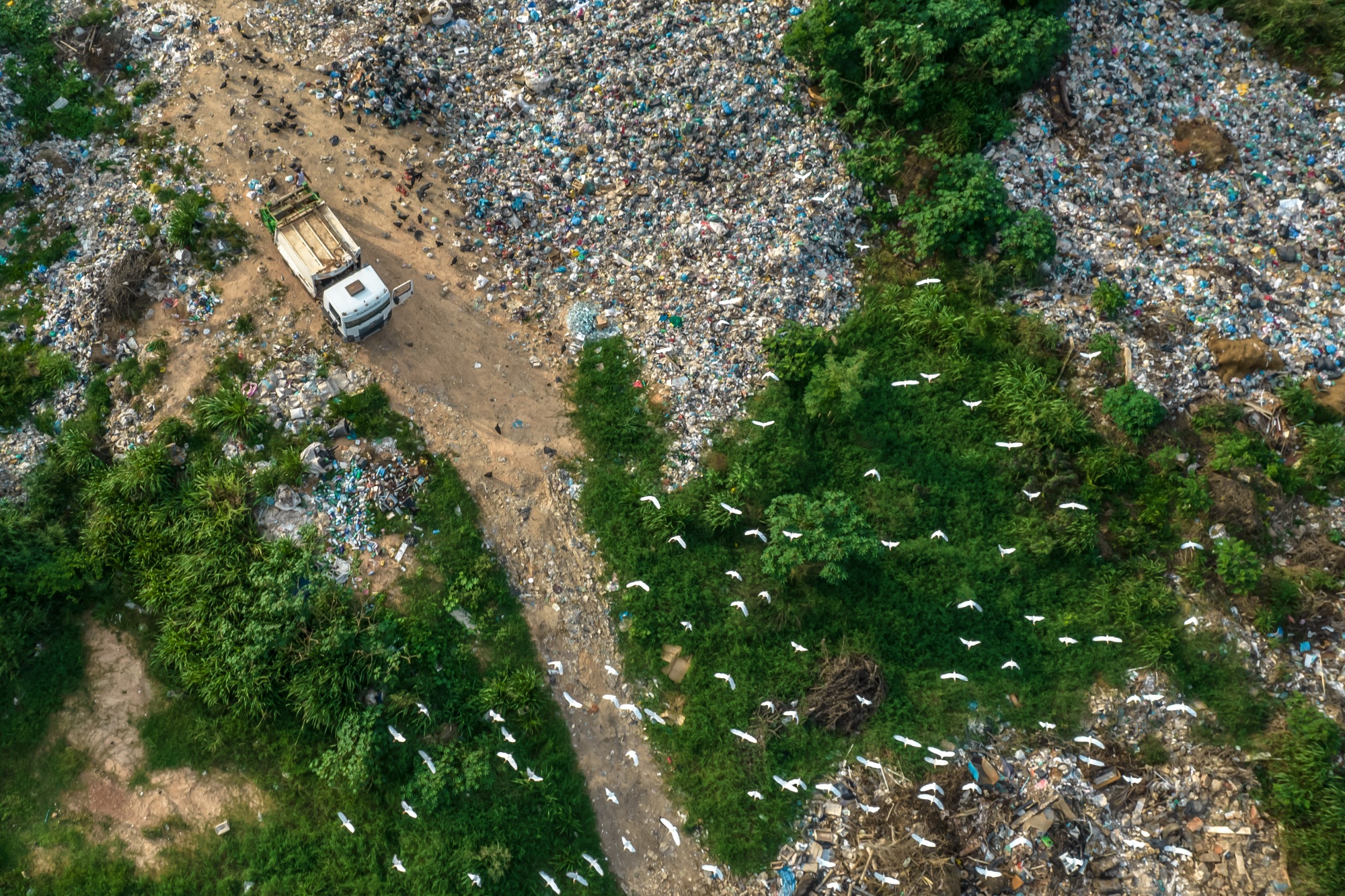 A truck dumps garbage at a landfill in Brazil&nbsp;on Oct. 5, 2021.&nbsp;