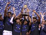 Duke Blue Devils celebrate winning the NCAA Men's Final Four National Championship at Lucas Oil Stadium in Indianapolis on April 6, 2015.