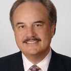 Headshot of Larry J Merlo
