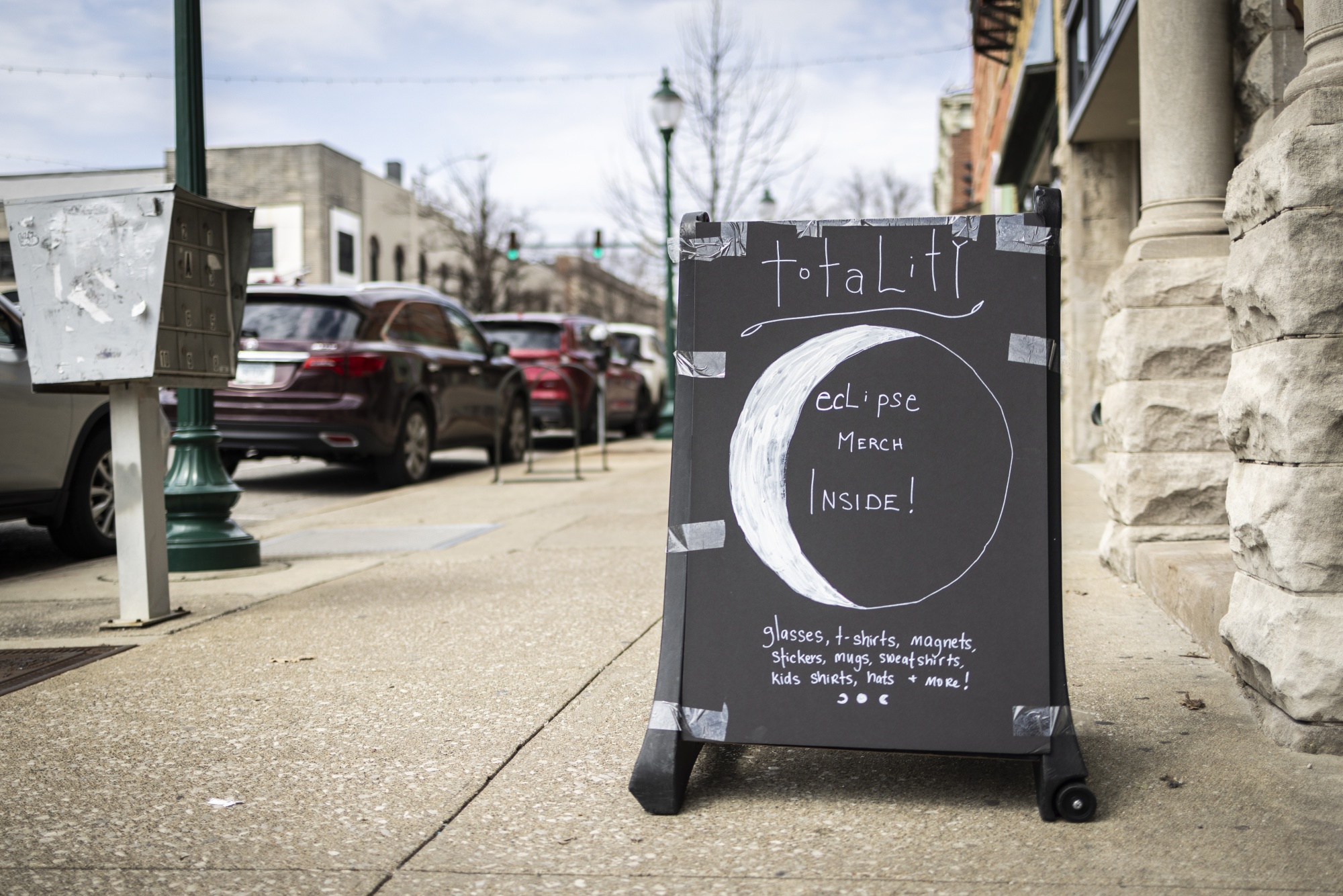 A sign outside of a store selling souvenirs ahead of the total solar eclipse in Bloomington, Indiana, on Sunday, April 7, 2024.