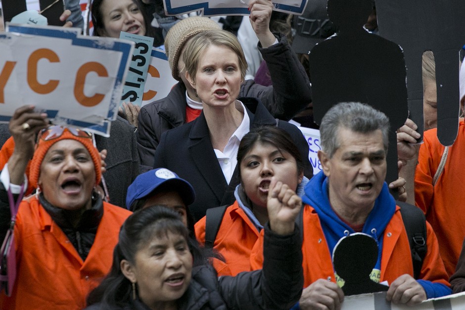 New York Democratic gubernatorial candidate Cynthia Nixon, center, joins with May Day protesters on Wall Street on Tuesday, May 1, 2018, in New York. Workers and activists marked May Day with rallies around the world. 