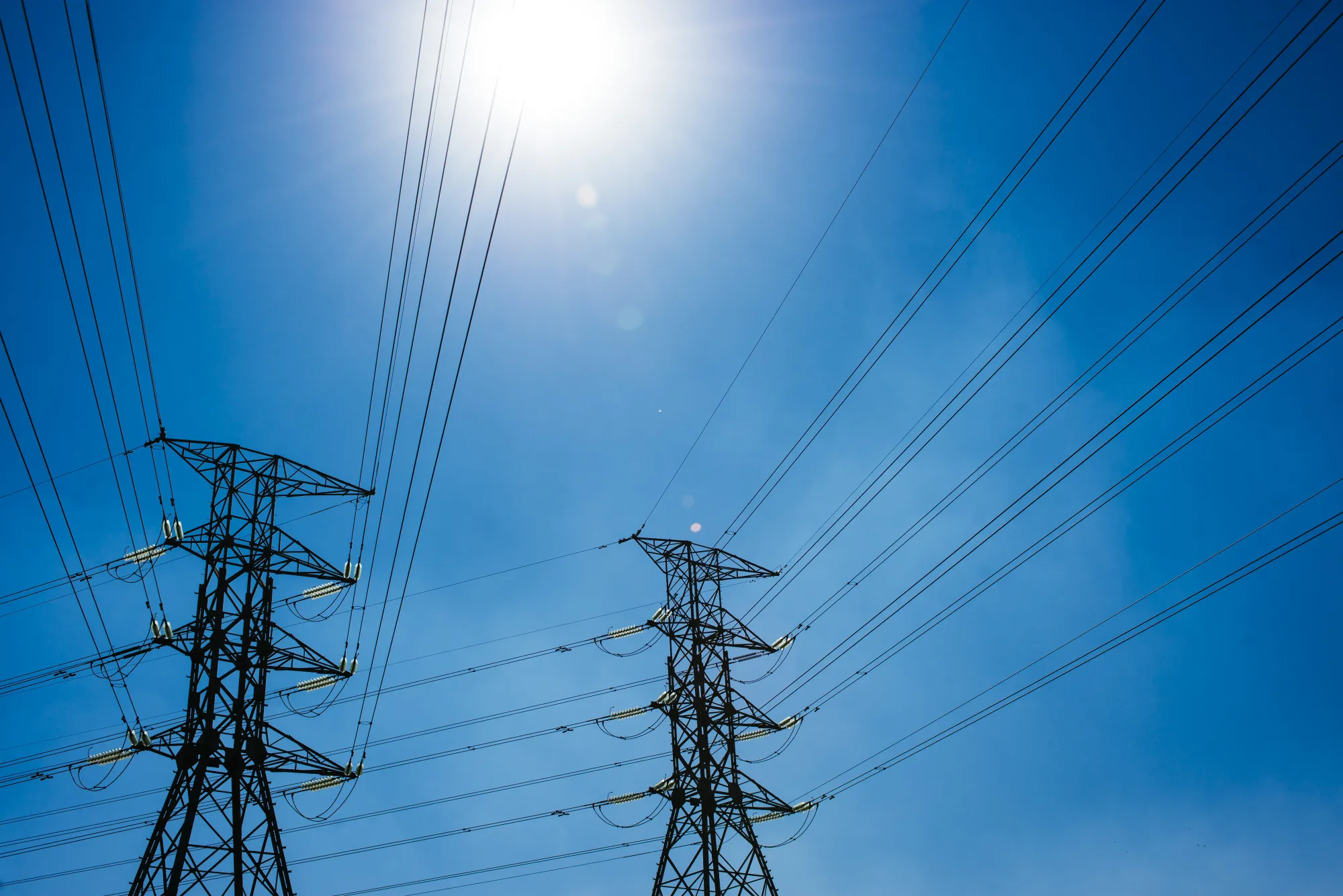 Electrical power lines hang from transmission pylons in Pretoria.