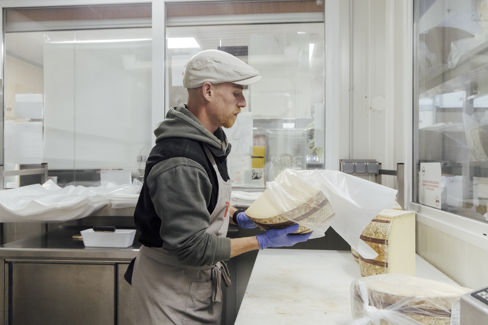 A cheese-cutting room at Paris’s Rungis market.