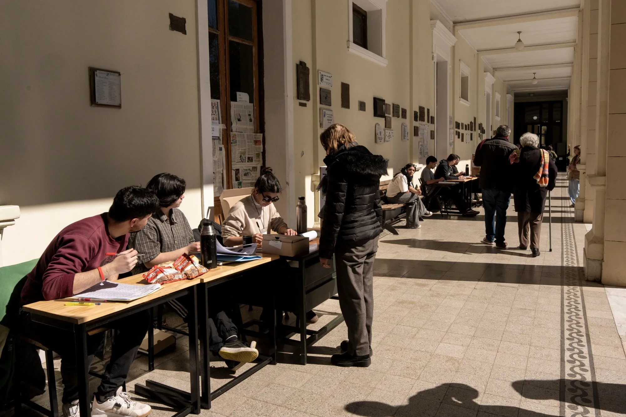 Voters arrive to cast ballots in the provincial election in La Plata, Buenos Aires province.