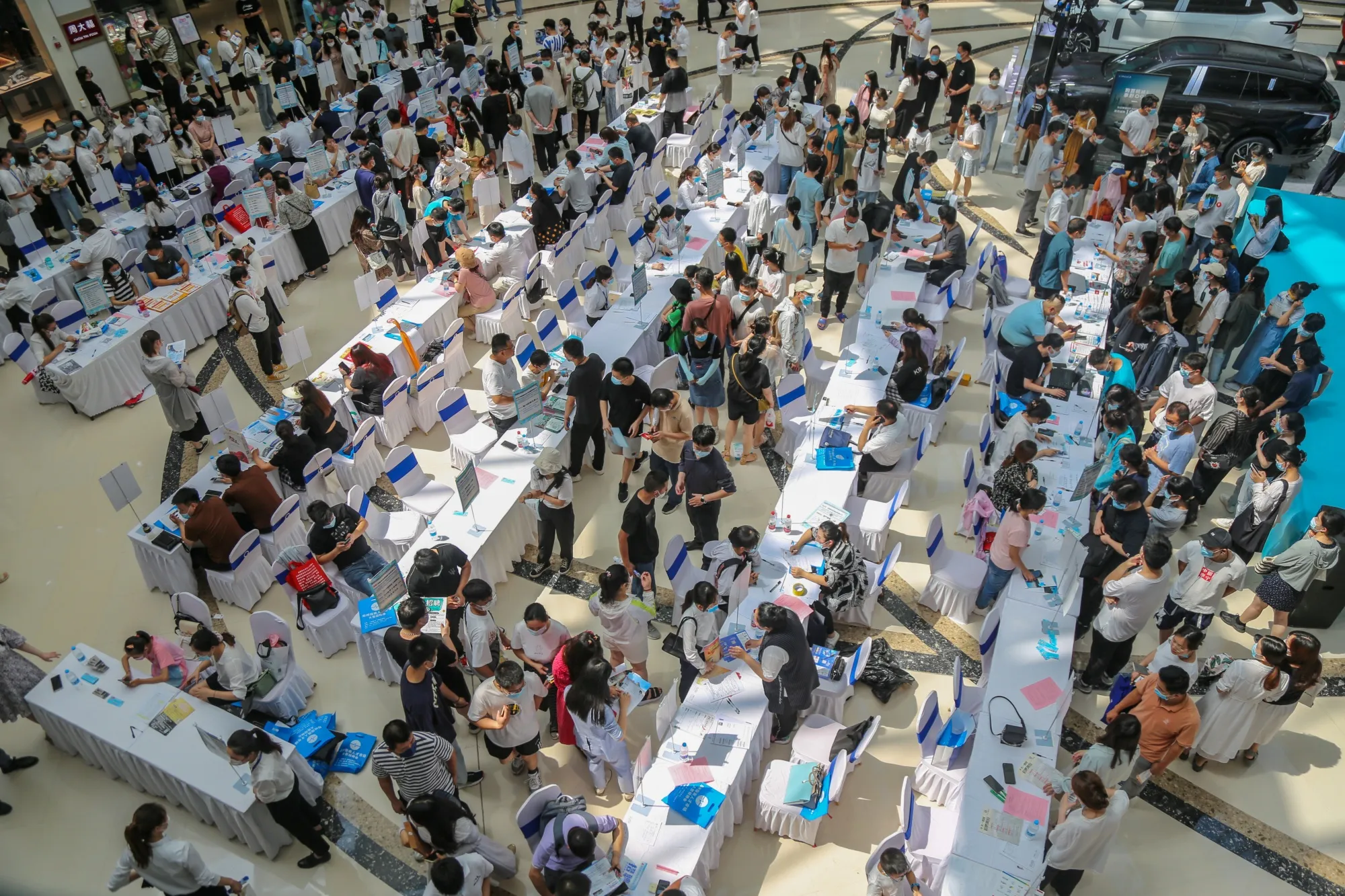 University graduates at a job fair in Zhengzhou, Henan Province, on June 17.
