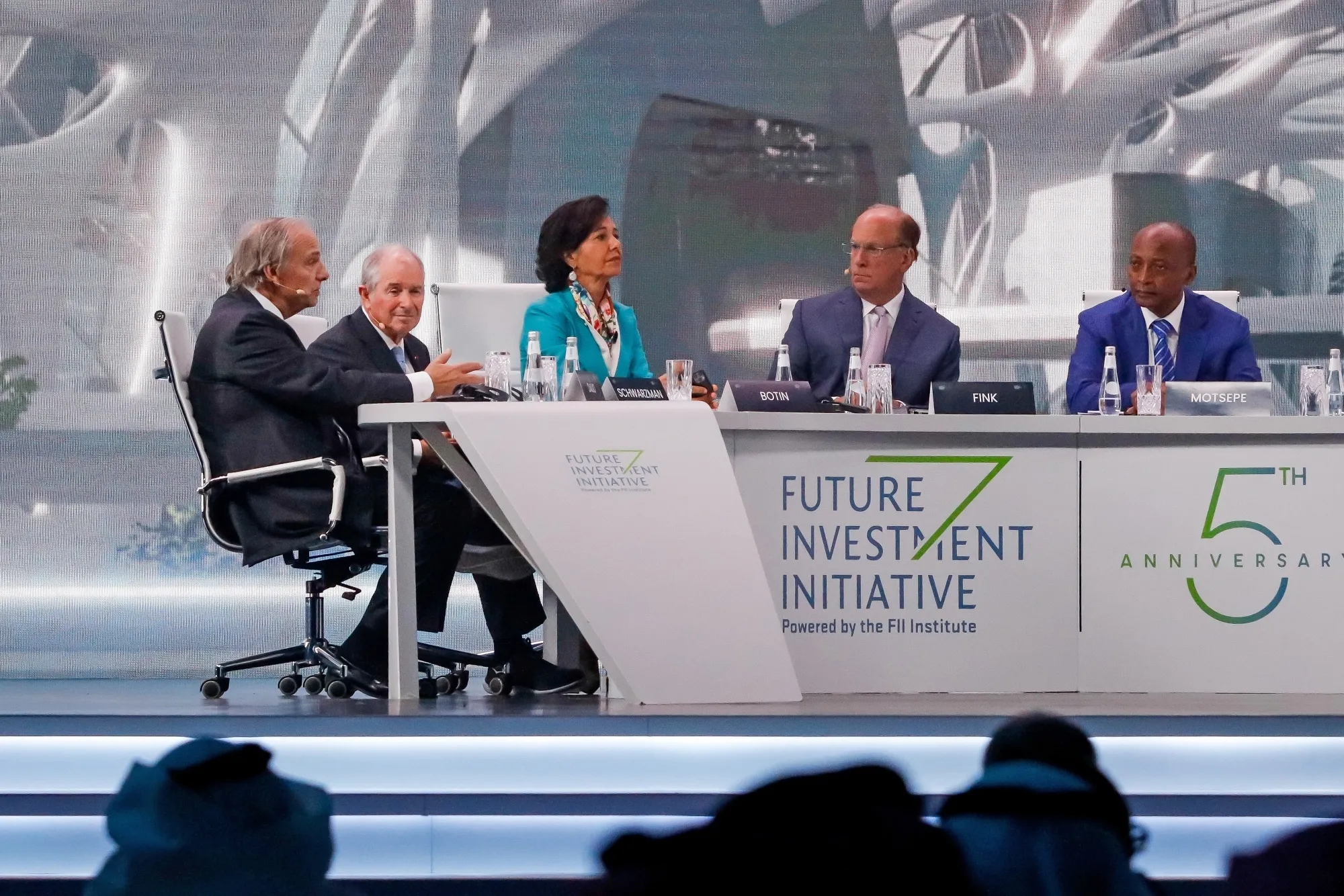 From left, Ray Dalio, Stephen Schwarzman, Ana Botin, Larry Fink, and Patrice Motsepe, during the opening panel of FII, on Oct. 26.