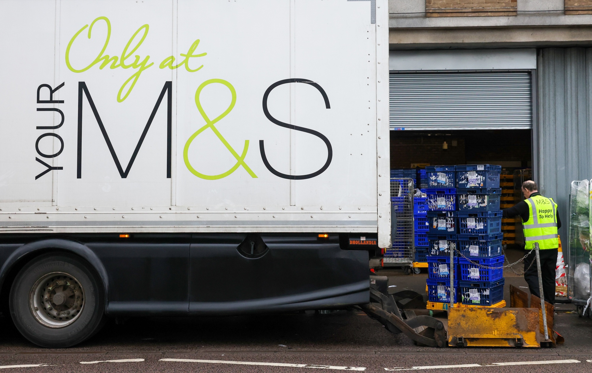M&S returns to FTSE 100 on food and clothes boost