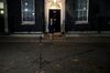 Theresa May, U.K. prime minister, walks out to deliver a statement in London.