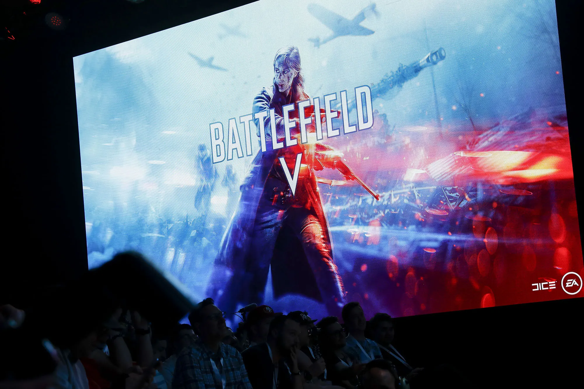 Attendees watch a preview for the Battlefield V video game during an EA&nbsp;Play event&nbsp;in Los Angeles.
