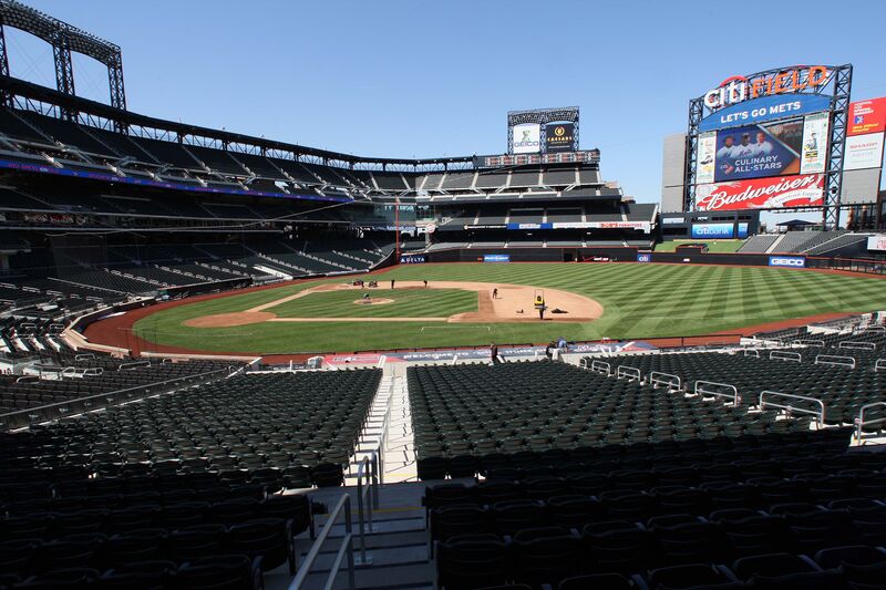 Crews work on the field at Citi Field, the home of the New York Mets, in Flushing, New York, U.S.