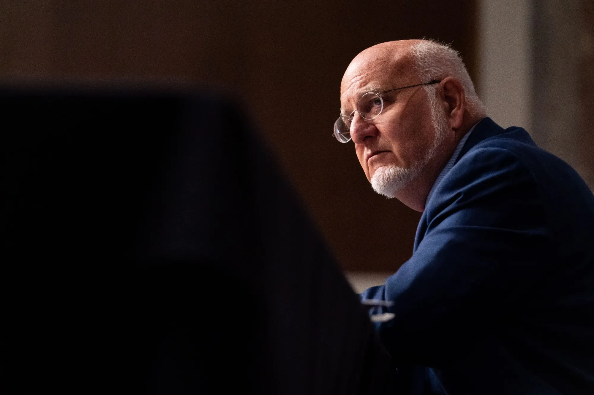 Robert Redfield, director of the CDC, listens during a Senate&nbsp;hearing in Washington, D.C., on&nbsp;Sept. 16.