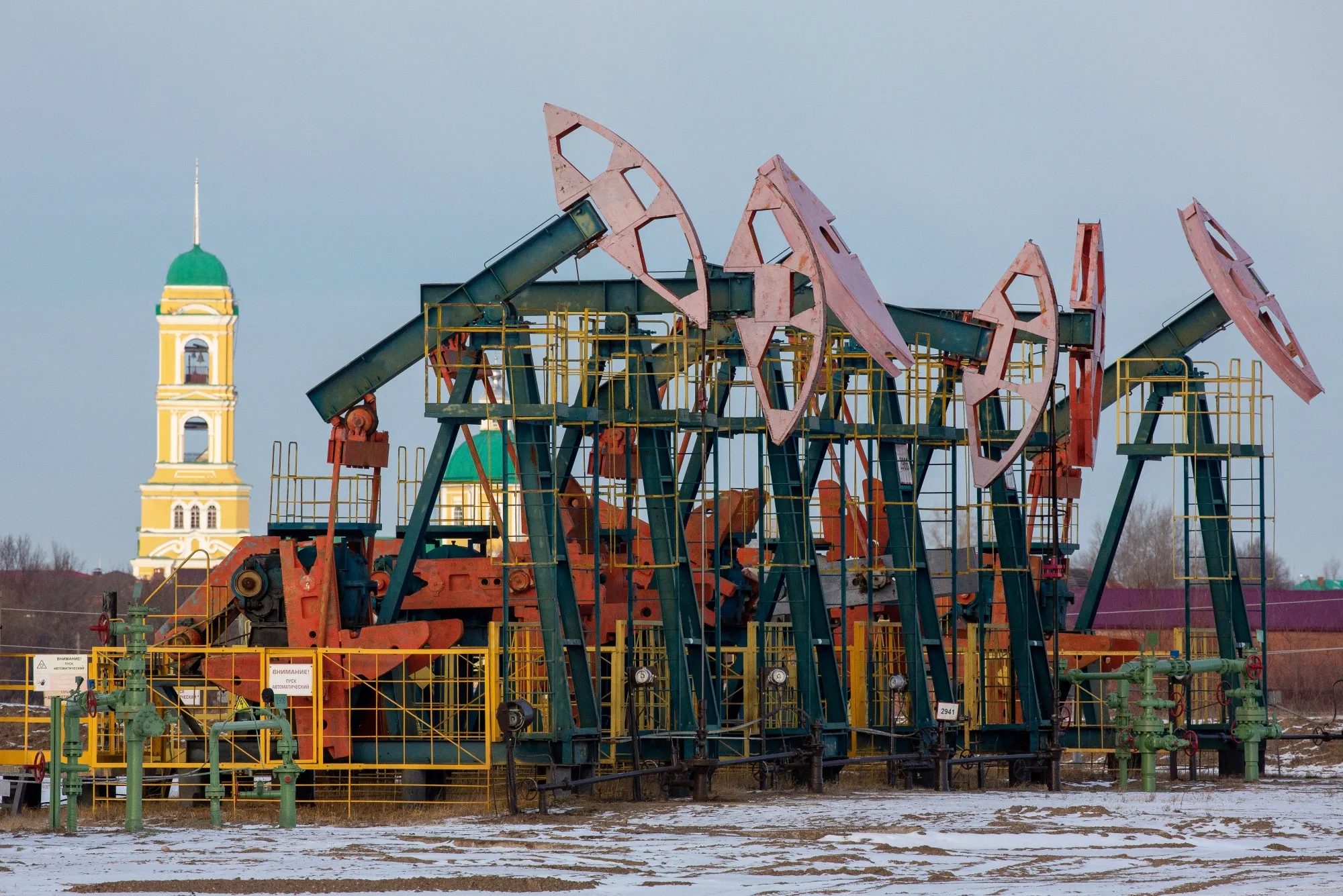Oil pumping jacks in Russia.