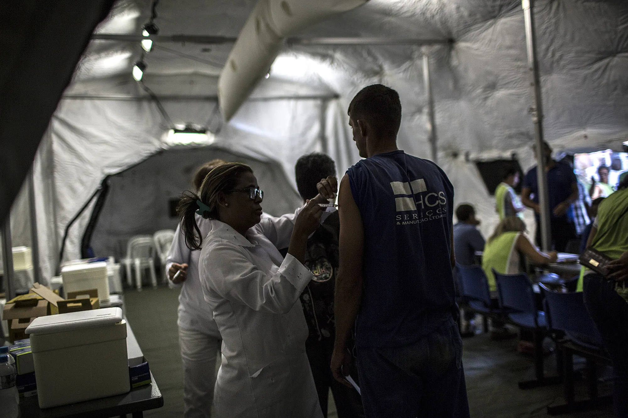 Health agents vaccinate people for yellow fever in the rural town of Casimiro de Abreu, Rio de Janeiro state, Brazil.