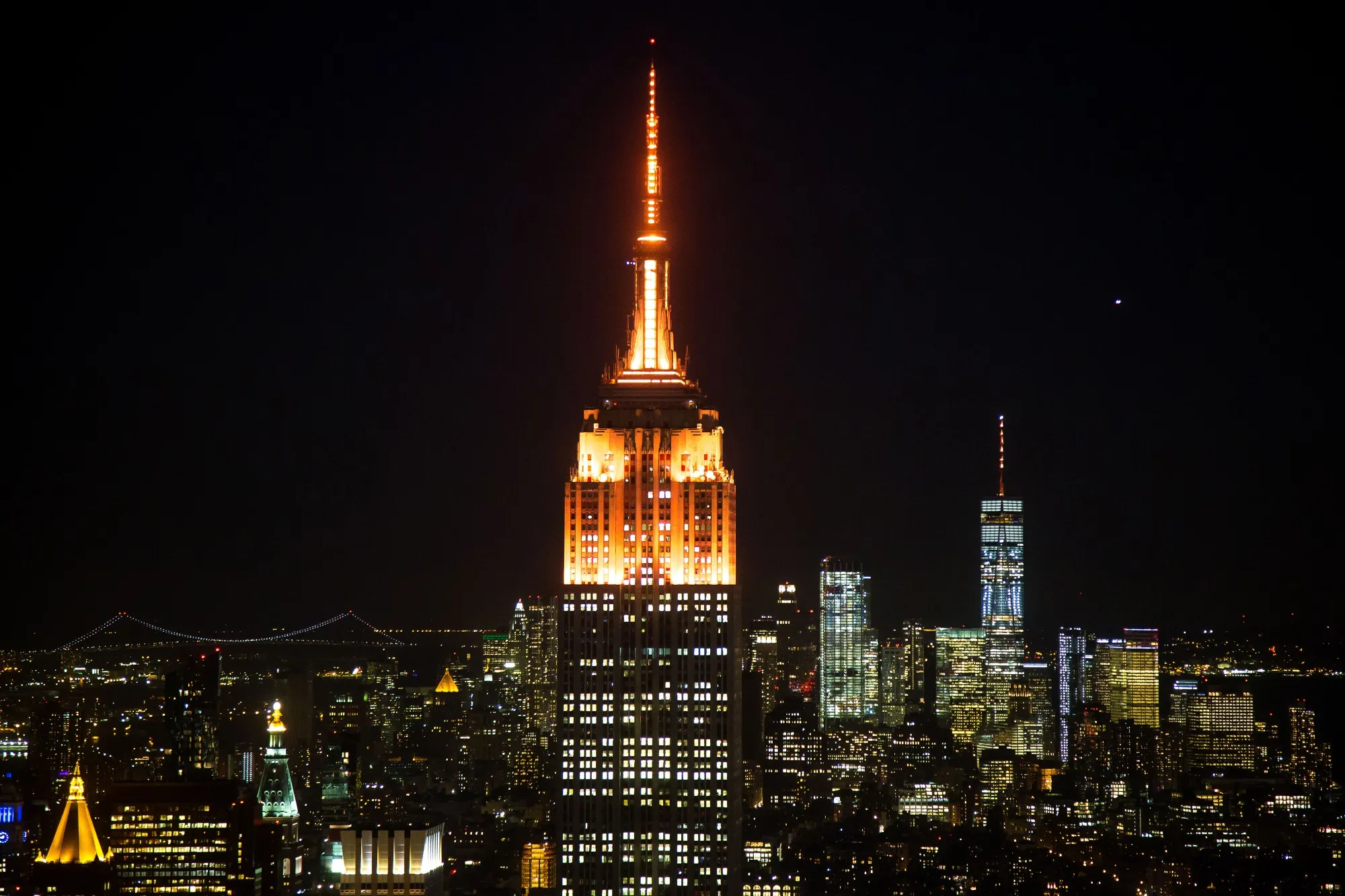 The spire&nbsp;of the Empire State Building was lit in orange to support a bid for Amazon's second headquarters in New York.