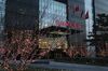 Signage for Anbang Insurance Group Co. is displayed atop the entrance to Anbang Financial Center at dusk in Beijing, China, on Saturday, Feb. 24, 2018. China's regulators will take control of embattled insurer Anbang for one year after a probe that began in June.