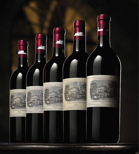 Bottles of 1869 vintage Lafite sold for a record $HK 1.8 million each at Sotheby's Oct. 29 auction in Hong Kong of wines sourced directly from Chateau Lafite-Rothschild. Each was expected to fetch between HK$40,000 and HK$60,000. Source: Sotheby's via Bloomberg