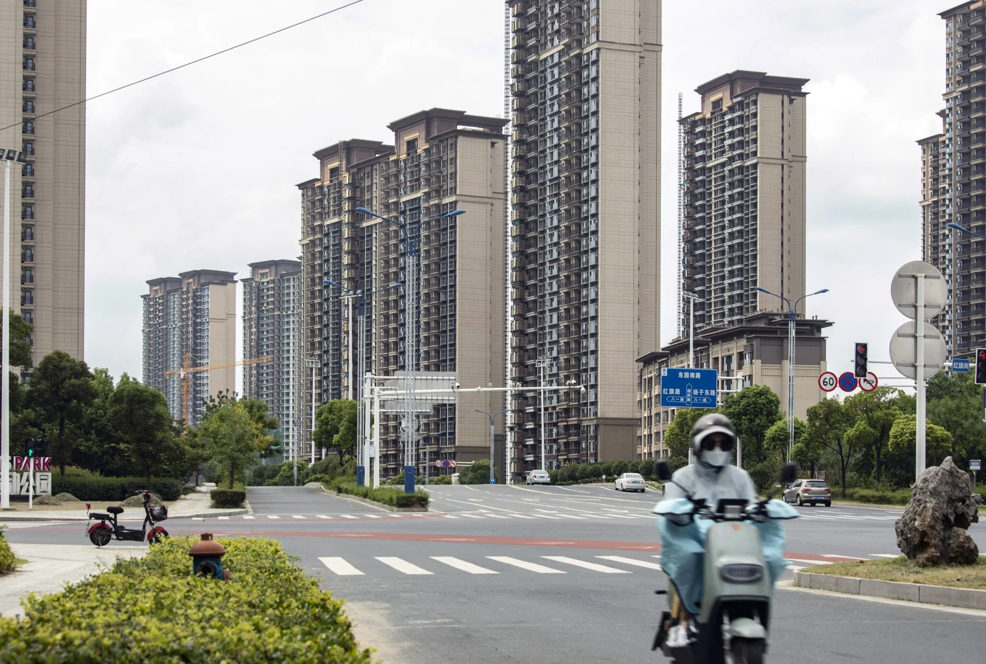 Residential buildings under construction at the Tao Yuan Tian Jing project, developed by China Evergrande Group, in Yangzhou, China.