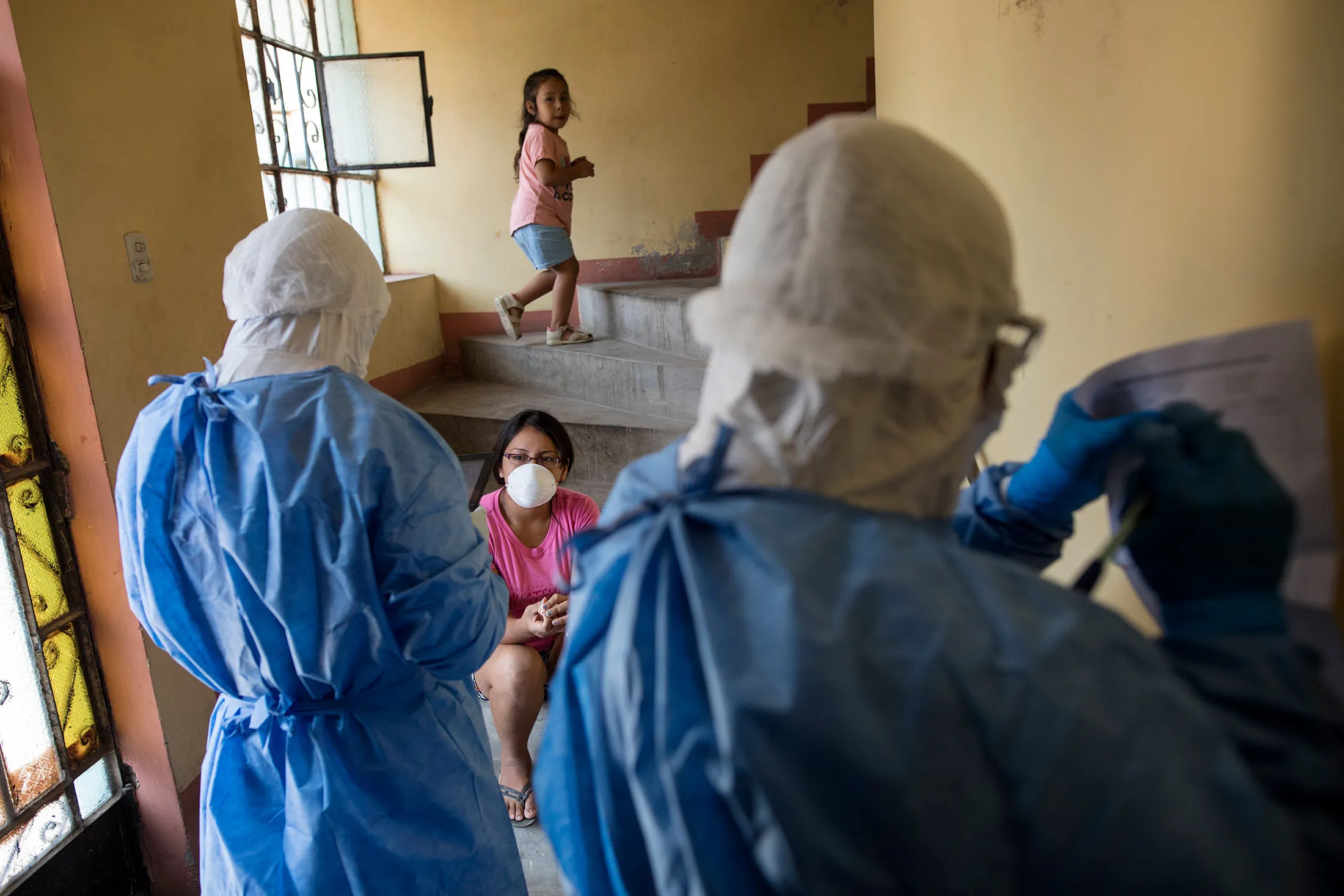 Doctors take notes after performing a coronavirus test in Lima, Peru, on April 13.&nbsp;