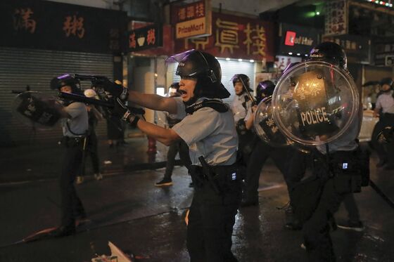 Tensions Escalate in Hong Kong Protests as Police Fire Weapon